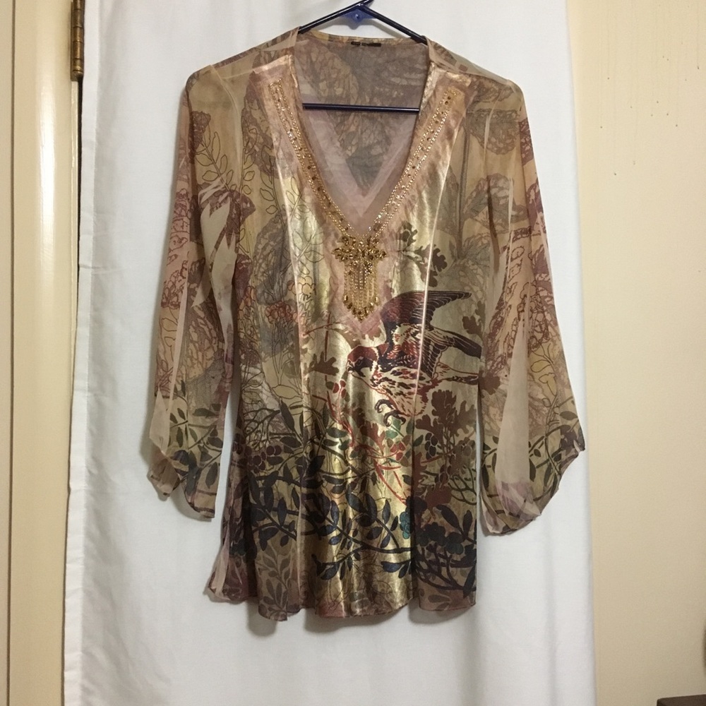 Silky top in shades of tan and brown Size Medium.